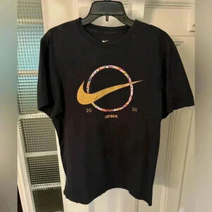 Nike 2020 Olympic World Cup tee with gold swoosh. Size medium black
